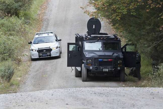 Man hunt continues Another Pennsylvania State Police contingent in a heavy armored vehicle searching the woods off Wildwood Road on Thursday afternoon October 2, 2014