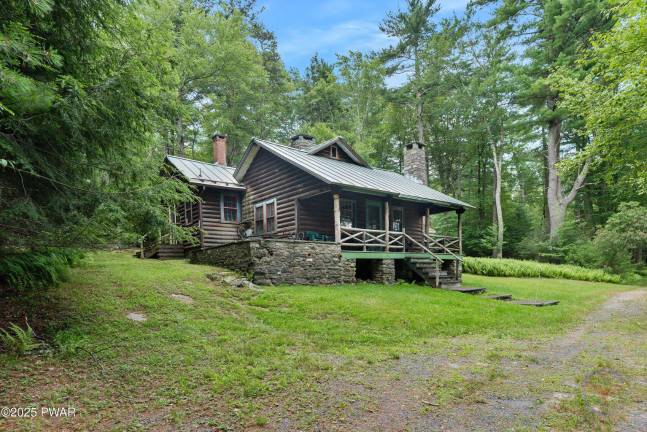 Log cabin on Silver Lake is once-in-a-lifetime opportunity Log cabin on Silver Lake is once-in-a-lifetime opportunity