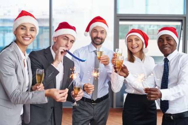 Office holiday parties get another look as scandals continue