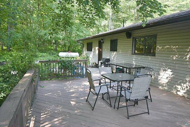 Spacious four-bedroom with pond and stream Back deck