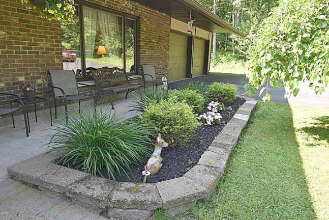Spacious four-bedroom with pond and stream Front