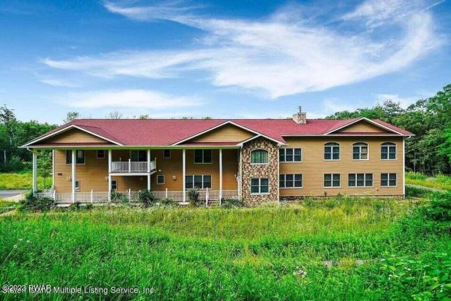 Upscale four-bedroom home is designed for resort living