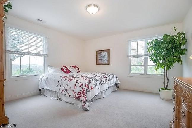 Enjoy mountain views from this light-filled colonial-style home Enjoy mountain views from this light-filled colonial-style home