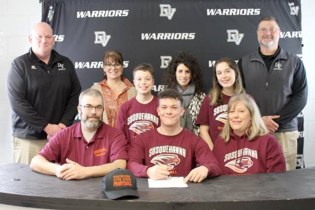 Pictured (left to right: front row) – Mr. Michael Kizis, senior Timothy Kizis and Mrs. Kristina Kizis