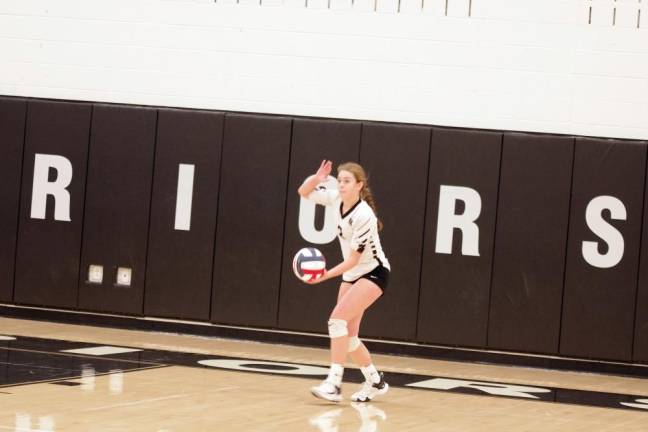 Delaware Valley's Lauren Donnelly is in the midst of a serve.