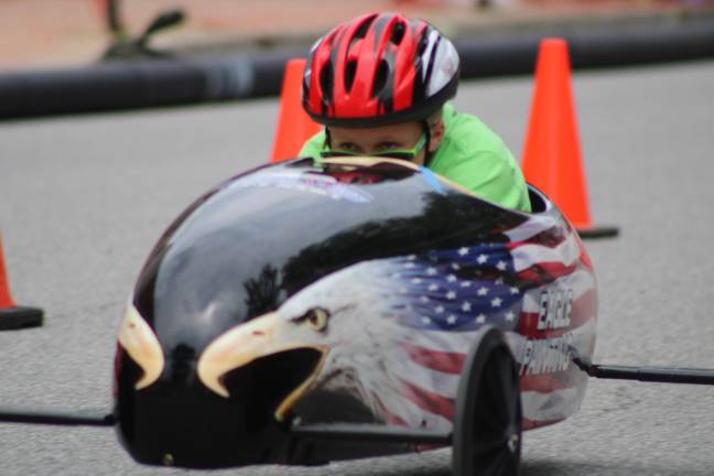 Soap Box Derby competition welcomes over 80 racers Liam Hunt drives his super stock car with an eagle eye.
