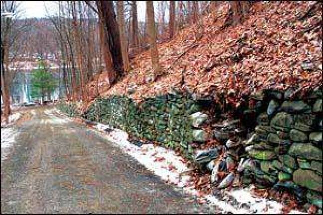 Vandals damage retaining wall Vandals damage retaining wall