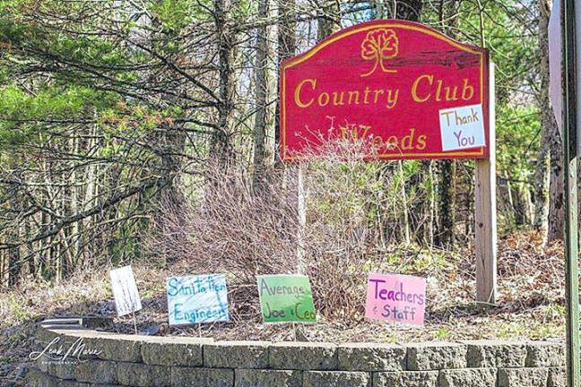 Photographer Leah Marie Kirk captured these signs at Country Club Woods, off Sawkill Avenue in Milford, with thank you's to sanitation engineers, teachers and staff, and average Joe &amp; CEO.