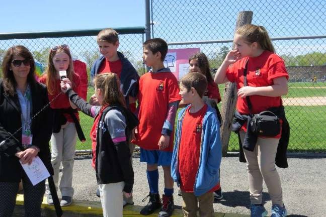 Special Olympics comes to DV Kim Butaitis, Principal of Dingman Delaware Primary School, was asked what it was like to be principal. She said it is a good job and fun. Her favorite event at the Special Olympics is the high jump. From left: Kim Butaitis, Ryan O’Connor, Adrianna Buchanan, Jason King, Ty Bates, Nixon Kameen, and Scarlett Weir.
