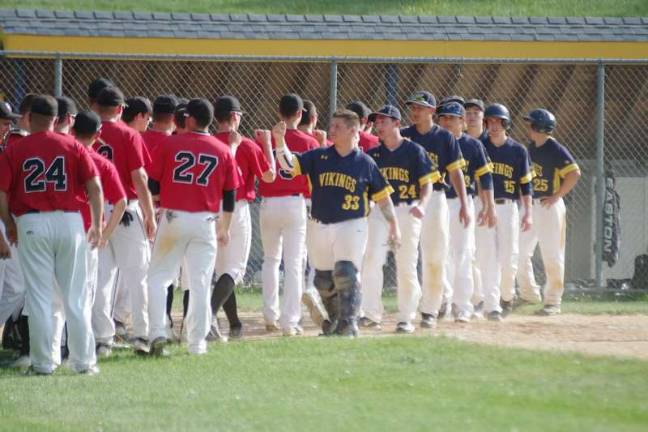 Warriors wear down Vikings Photos by George LeRoy Hunter The Delaware Valley Warriors and Vernon Vikings shake hands and fist bump post game.