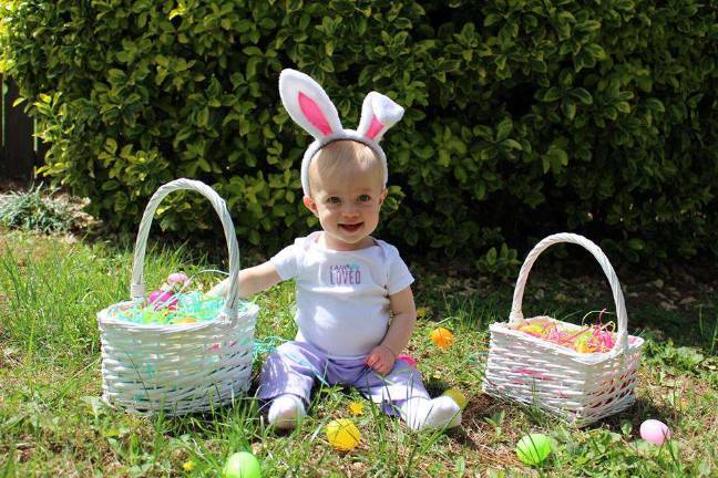 Oh Baby, it's Spring! Baby Photo Contest Photo, Bill King of Milford "Classic Easter Picture with my baby Charlotte 10 months old. She is always happy to take a picture."