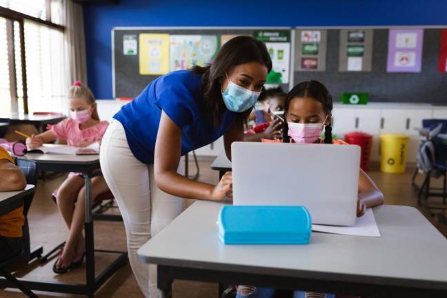 Some schools hit hard by virus make few changes for new year Some schools hit hard by virus make few changes for new year