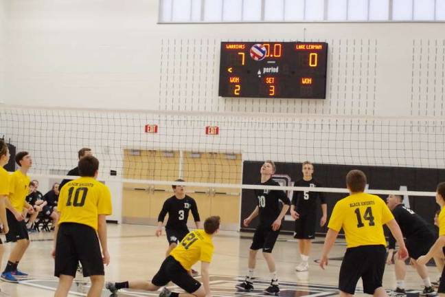 Delaware Valley Warriors top Lake-Lehman Black Knights The Delaware Valley Warriors and the Lake-Lehman Black Knights focus on the ball high above the net