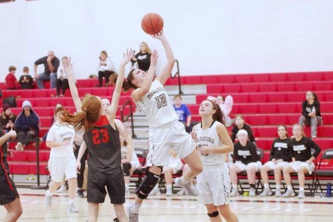 Delaware Valley's Mackenzie Olsommer leaps skyward during a shot attempt in the third quarter. Olsommer scored 19 points.