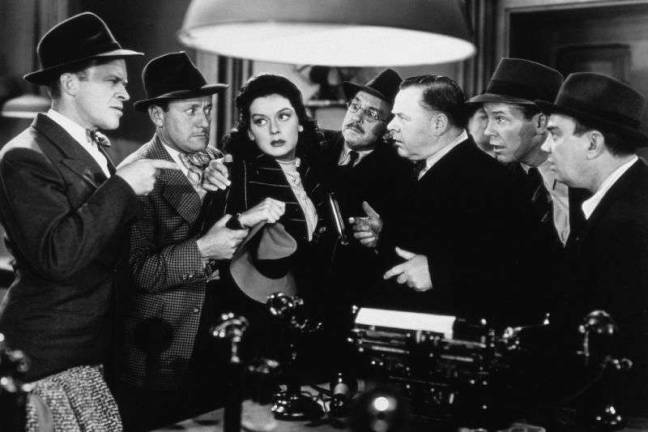 From left: Frank Jenks, Roscoe Karns, Rosalind Russell, Porter Hall, Gene Lockhart, Regis Toomey, and Cliff Edwards in &quot;His Girl Friday,&quot; which starts off the series on Jan. 17 (Wikipedia Commons)