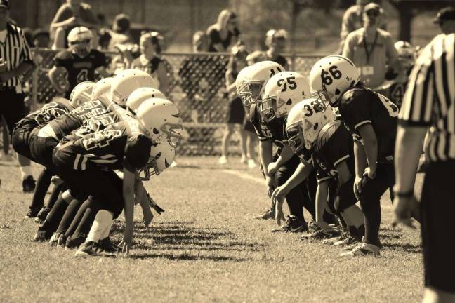 Register for football and cheerleading July 18 Register for football and cheerleading July 18