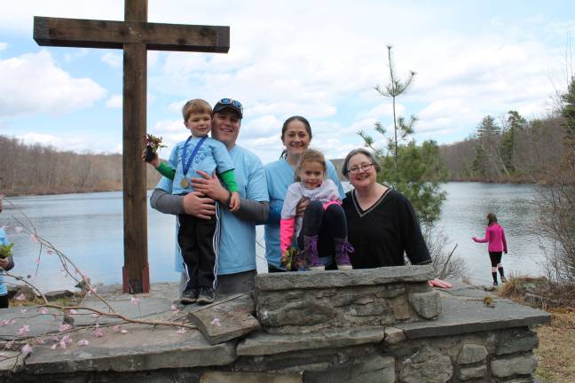Service supports Lordi family, takes service outside for 5K The Lordi family, with parents Chris and Leslie, and children Anthony, left, and Josie, right, and Rev. Luana Cook Scott. Milford United Methodist Church moved its 10:30 service outside to support the Lordis.