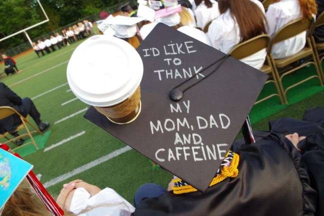 Delaware Valley graduates are all smiles A creative thank you is expressed on a cap.
