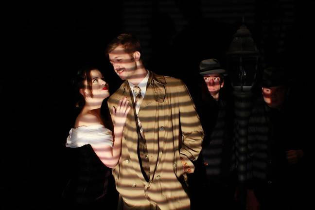 Hitchcock's '39 Steps' takes a funny turn in ESU production Students from East Stroudsburg University’s Department of Theatre rehearse a scene from The 39 Steps. From left: Abigail Witt, a freshman from Mountainhome, Pa., majoring in musical theater; John Lauri, a senior from Long Pond, Pa., majoring in theater with a concentration in directing; Jules Gindraux, a sophomore from East Stroudsburg, Pa., majoring in theater with a concentration in acting for theater, television and film; and William Barreto, a senior from East Stroudsburg majoring in theater and minoring in English. (Photo provided)