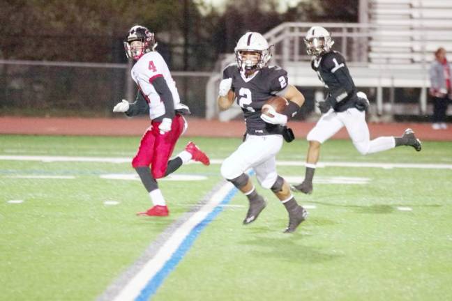 Delaware Valley ball carrier Josh Balcarcel is on the run in the open field in the first half. Balcarcel rushed for 139 yards resulting in 2 touchdowns.