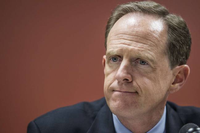 NEPA group protests travel ban at 'Tuesdays with Toomey' U.S. Senator Pat Toomey of Pennsylvania (toomey.senate.gov)