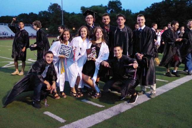 Delaware Valley graduates are all smiles Delaware Valley High School graduates strike a pose.
