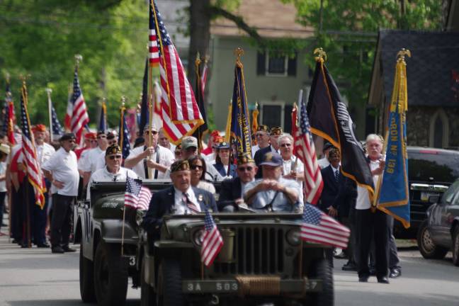 Remembering those who served Military veterans await the start of the Memorial Day parade.