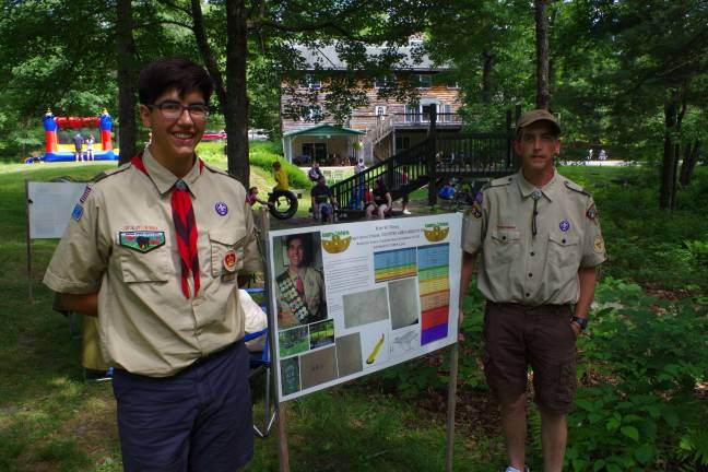 A Day at Country Ark Farm At left, Boy Scout Nate Hayes and his father of Milford pose. Hayes, who is a member of Troop 174 of Dingmans Ferry, will be constructing an addition to the playground area at Country Ark Farm later this year.