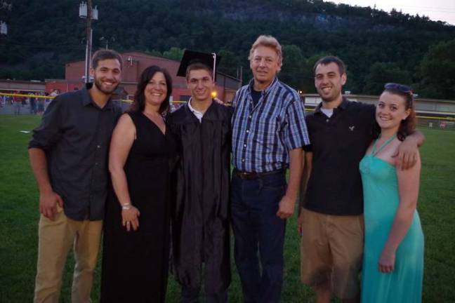 Delaware Valley graduates are all smiles Graduate Thomas Smith with his family.