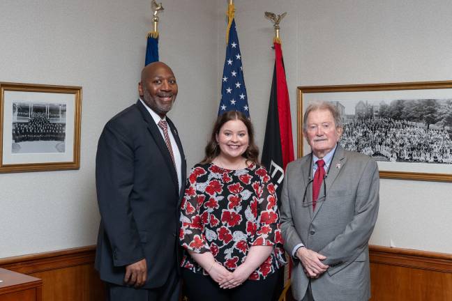 Student trustee named From left, ESU President Kenneth Lone,. Trustee Ainslee Green, COT Chair L. Patrick Ross