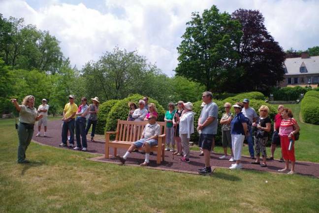A walk through history A tour guide explains the development of the landscape at Grey Towers.