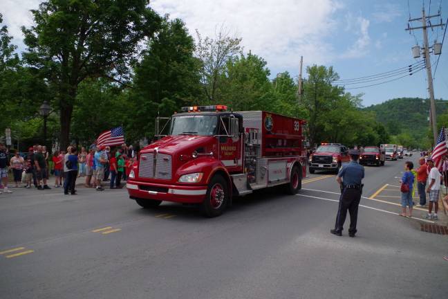 Remembering those who served Picking up the rear of the parade was the Milford Fire Department and Emergency Medical Services.