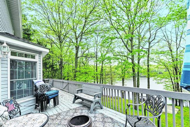 Lakefront views and a private dock await Lakefront views and a private dock await