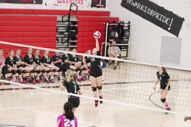 Lady Warriors strike down Lady Preppers on volleyball court Delaware Valley's Evie Kelly strikes the ball. Kelly contributed 17 service points and 6 aces. (Photo by George Leroy Hunter)