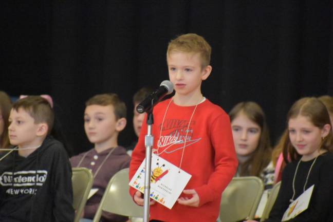 Nicholas Montevechi at the mic. The school does the bee annually, but this year’s had more official trappings than ever before - held in the auditorium with microphones and a bell that dinged for incorrect words.