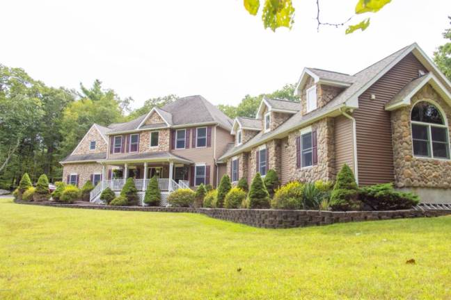Upscale center hall colonial offers space and privacy Exterior