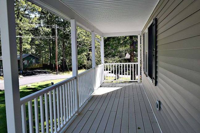 Modern two-story colonial with lake and pool access Modern two-story colonial with lake and pool access