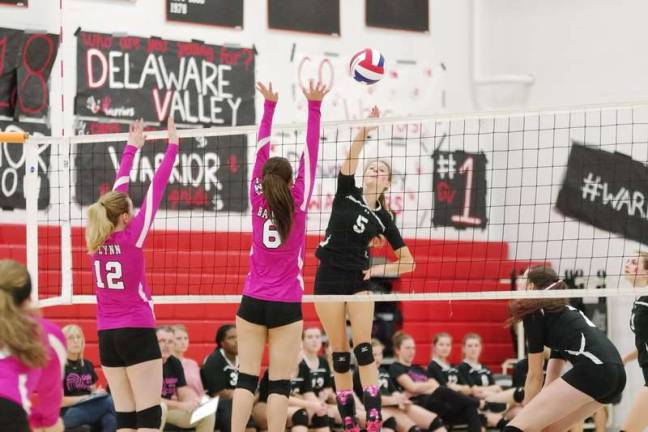 Lady Warriors strike down Lady Preppers on volleyball court Delaware Valley's Brooke Williams (5) strikes the ball. Williams contributed 12 kills and 6 service points. (Photo by George Leroy Hunter)