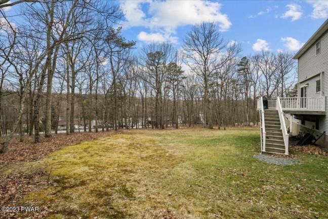 Move right into a roomy contemporary in the woods Move right into a roomy contemporary in the woods