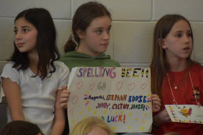 The cheering section. Spellers clapped for each other and were good sports all around.