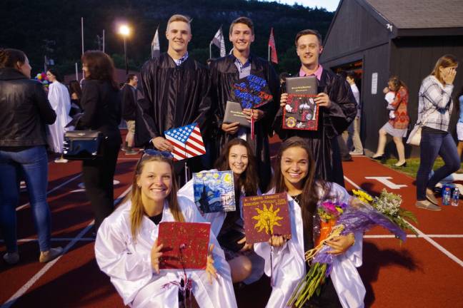 Into the future for the Class of 2016 Kneeling (from left): Shannon Irwin, Lindsay Lowell and Ashley Gatto. Back row: Robert Korfmann, Ryan Woolley and Thomas Oakley