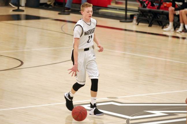 DV Warriors defeat Valley Central Vikings in holiday tournament Delaware Valley's Blake Gearhart scored a game-high 15 points. Gearhart was named tournament MVP. (Photo by George Leroy Hunter)