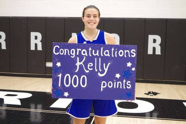 Lady Cougars top Lady Warriors in holiday basketball tourney Kelly Insalaco was named tournament MVP after leading Kittatinny with 21 points, scoring her 1,000th career point in the process. (Photo by George Leroy Hunter)