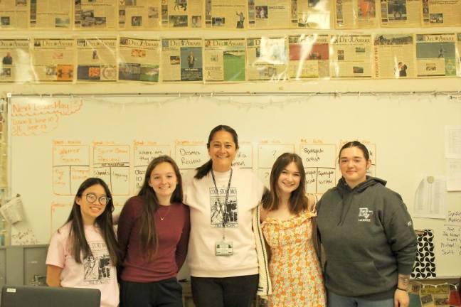 Pictured from left to right: Seniors Alex Krakowski and Kyla Stead, adviser Mrs. Leslie Lordi and seniors Liz Kameen and Sophia Perrin