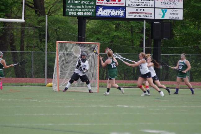 Minisink Valley trumps Delaware Valley girls Minisink Valley Warrior Ali Dalton (12) is within scoring range in front of the goal post. Dalton scored 8 goals.