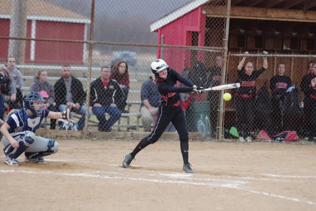 Delaware Valley Warriors suffer season opener loss in baseball and softball Delaware Valley batter Amanda Floystad connects with the ball.
