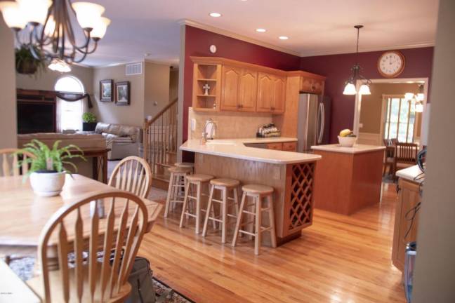 Upscale center hall colonial offers space and privacy Kitchen