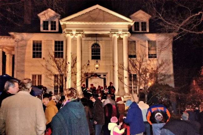 Milford tree lighting is set for Dec. 2 Last year's tree lighting in front of Milford Community House (Photo by Anya Tikka)