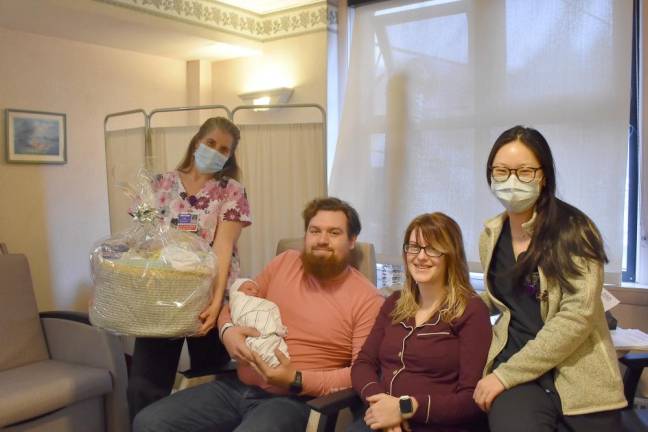 Left to right: Mary Jeanne Joyal, RN; Damian Burrows; Brantley and Anastasia Dunlap, Dr. Angela Tang