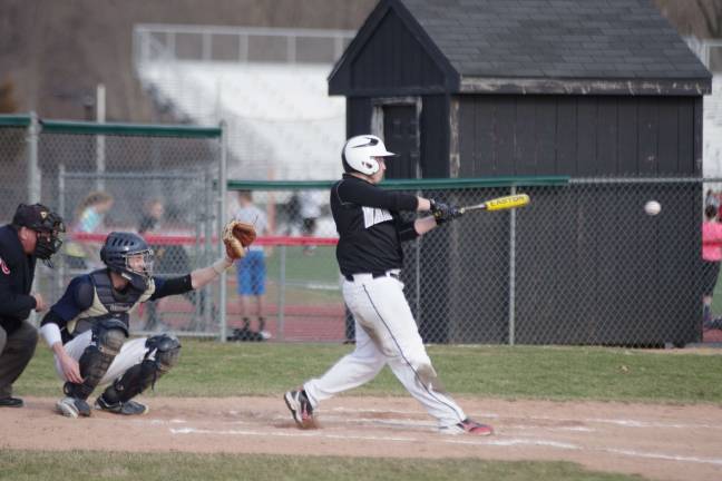 Delaware Valley Warriors suffer season opener loss in baseball and softball Delaware Valley batter Coty Amant connects with the ball.